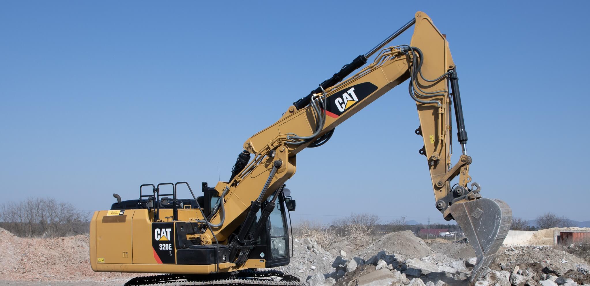 Pásové rýpadlo CAT 320E pri výkope